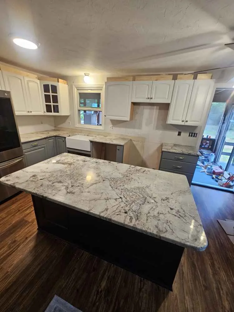 Crema Antique granite kitchen countertop in a Loudon, New Hampshire home.