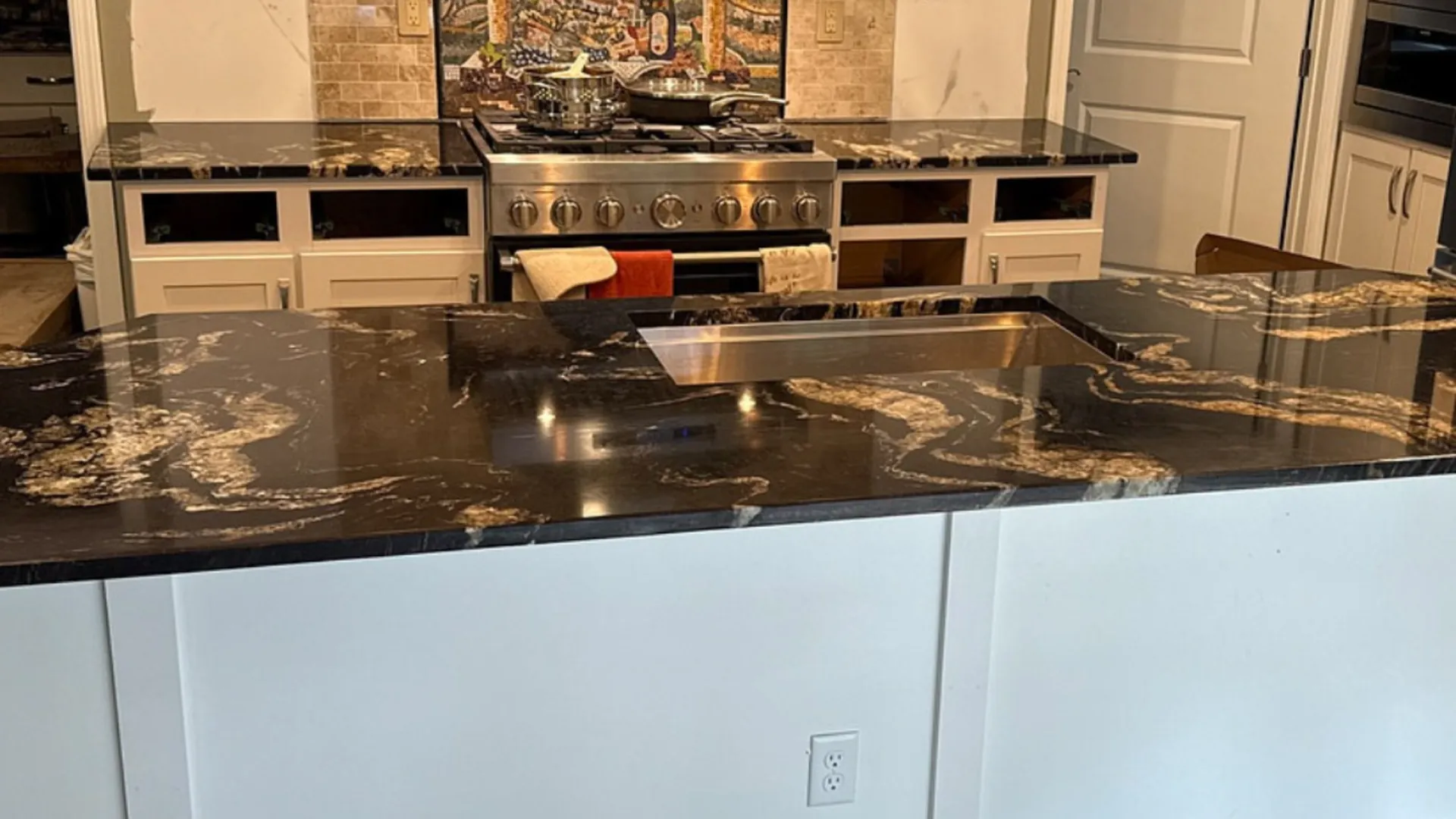Granite countertop slab with natural veining installed in a New Hampshire kitchen