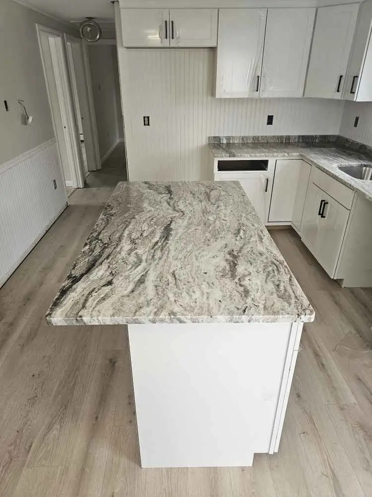 White Kitchen Remodel in Laconia, NH by Precision Granite Works project photo