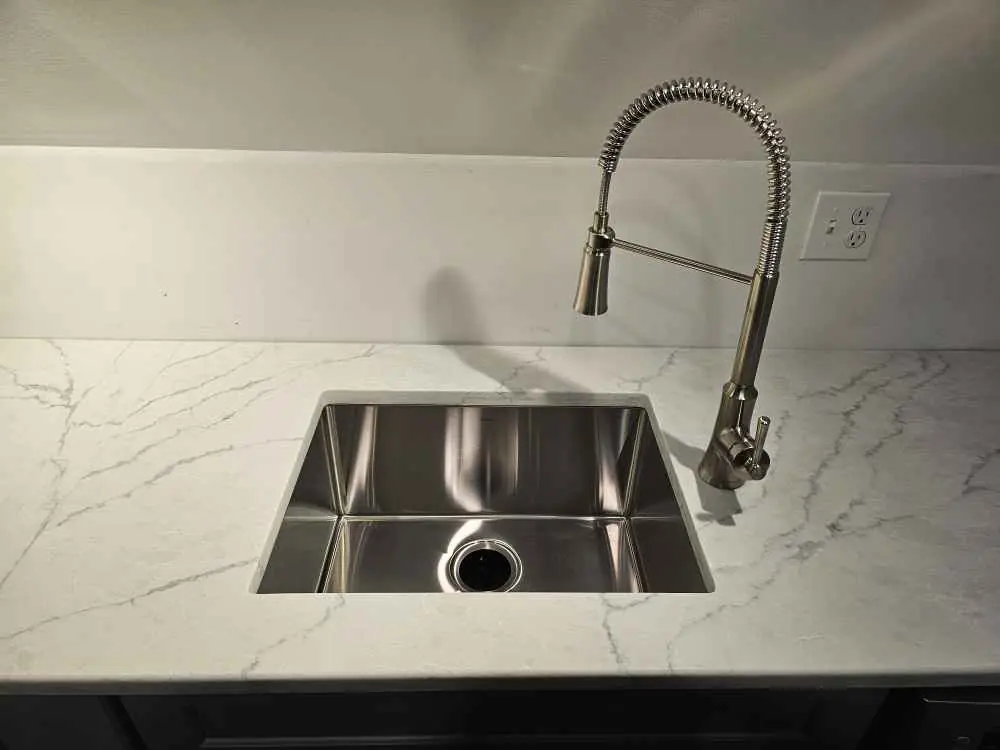 Quartz Remnant Kitchen Remodel in Manchester, NH by Precision Granite Works project photo