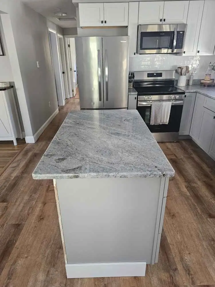 White Kitchen Remodel in Manchester, NH by Precision Granite Works — Project 1 project photo