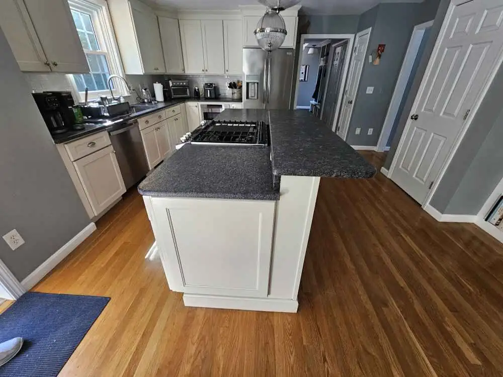 Silver Pearl Leathered Granite Kitchen Remodel in Exeter, NH by Precision Granite Works project photo