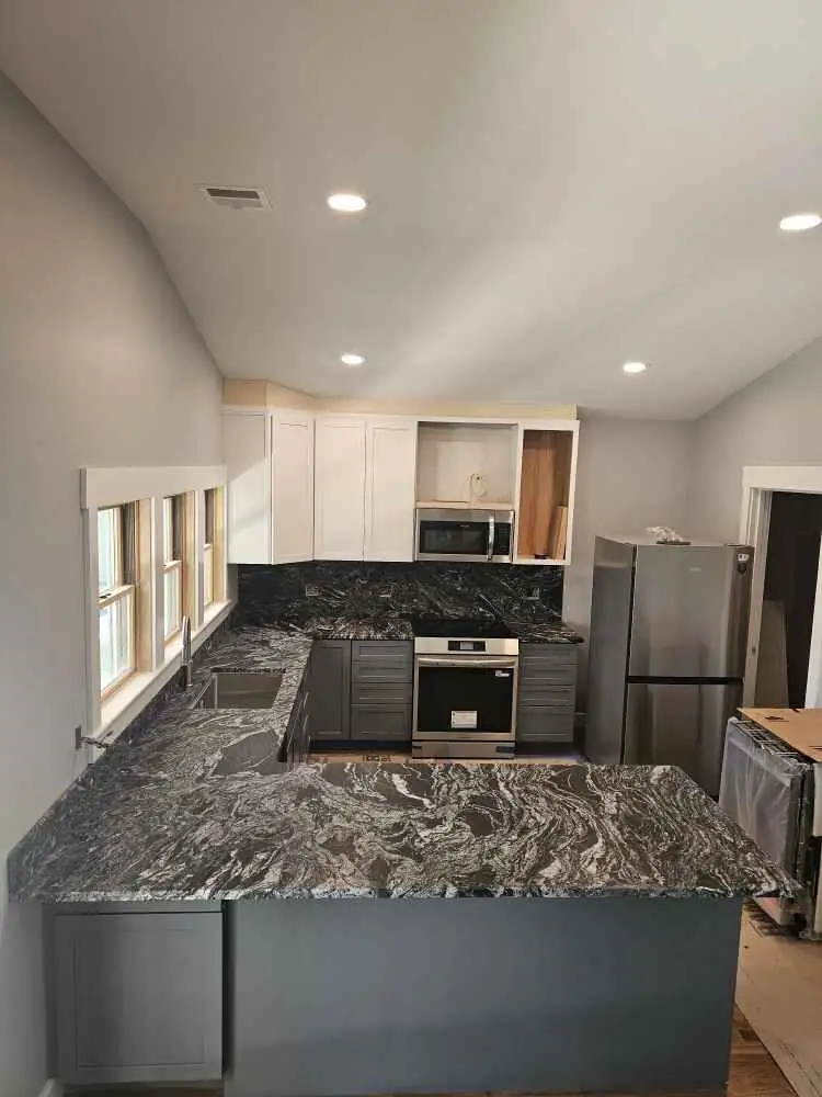 Silver Waves granite kitchen countertops installed by Precision Granite Works in Freedom, NH