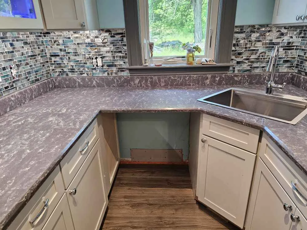 Pietra Grey quartz kitchen countertop installed in a Franklin, NH home