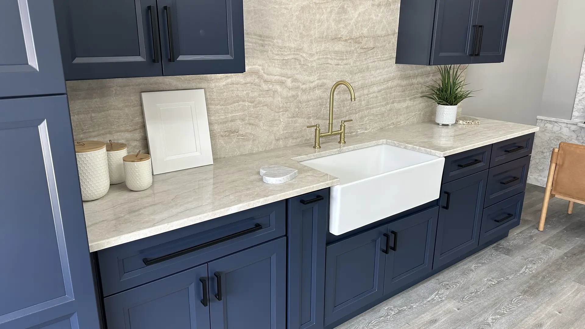 Quartzite countertop with bold natural veining in a New Hampshire kitchen
