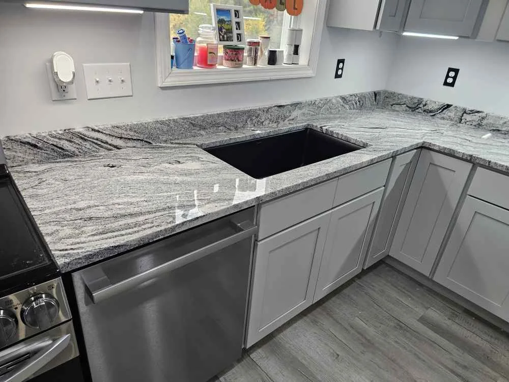 Granite countertop with undermount sink cutout — seam and sink planning by Precision Granite Works in Farmington, NH