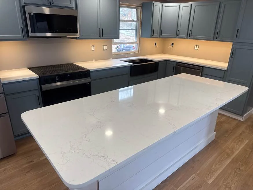 Quartz kitchen island countertop installed by Precision Granite Works — precise templating result in NH